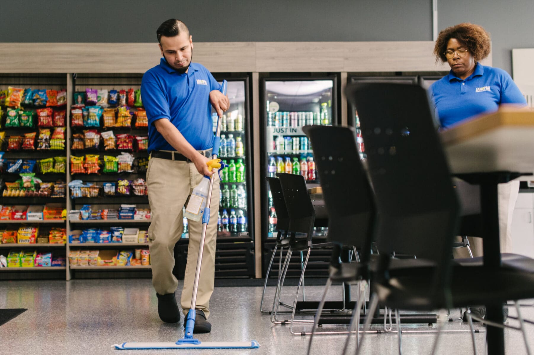 a JAN-PRO cleaner cleaning a commercial floor