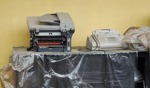 dusty old office equipment on a table