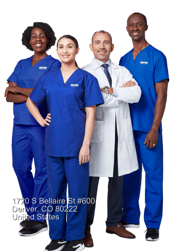 a group of medical professionals wearing JAN-PRO Cleaning & Disinfecting branded scrubs and a man wearing a doctor wearing a white coat