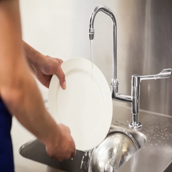 day porter cleaning dishes