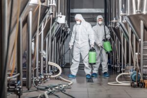 Industrial cleaners cleaning a factory.