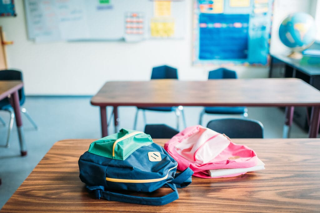 backpacks on the table poor school cleaning