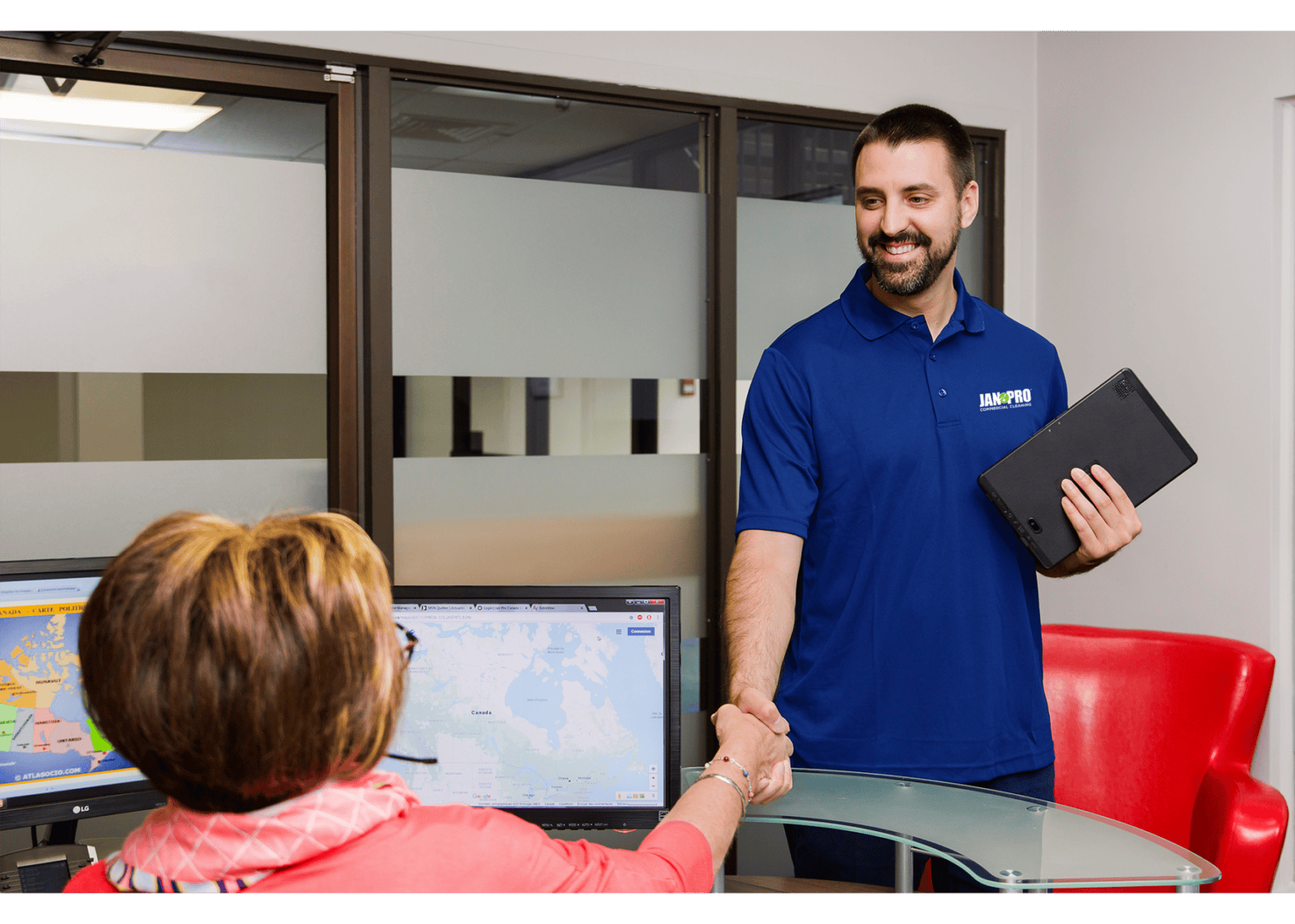 JAN-PRO worker greeting a client