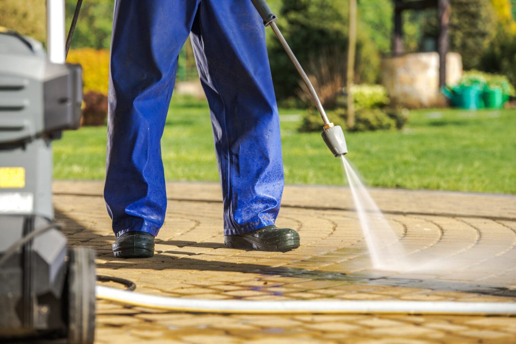a JAN-PRO cleaner power washing the floor