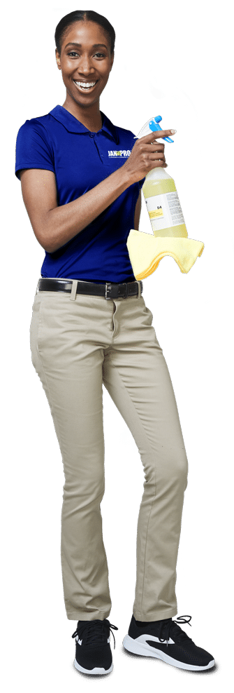 A JAN-PRO Cleaning & Disinfecting owner-operator in uniform, ready to work